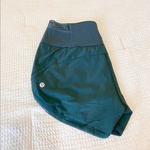 green lululemon shorts